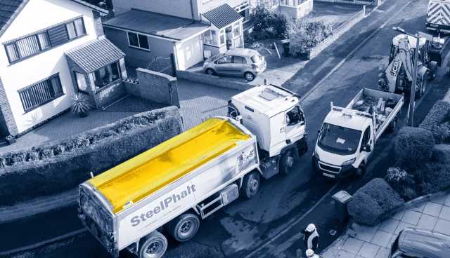 SteelPhalt truck on narrow road