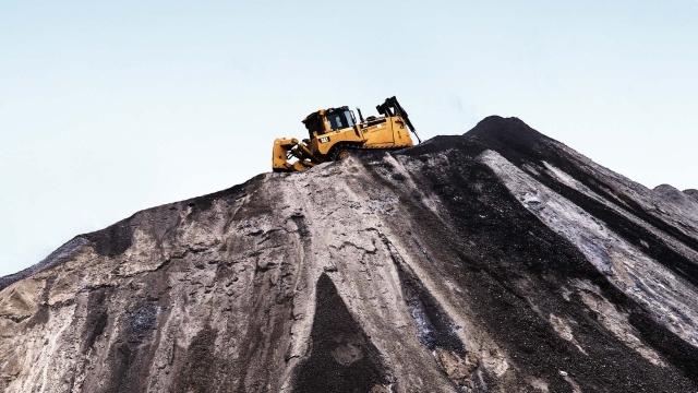 Truck going up slag mountain