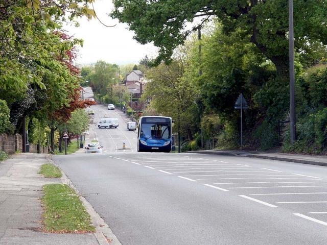 bus driving on road