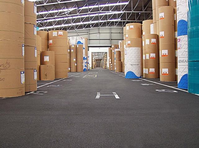 warehouse floor and barrels